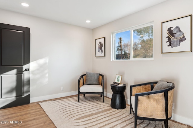 living area featuring light hardwood / wood-style floors