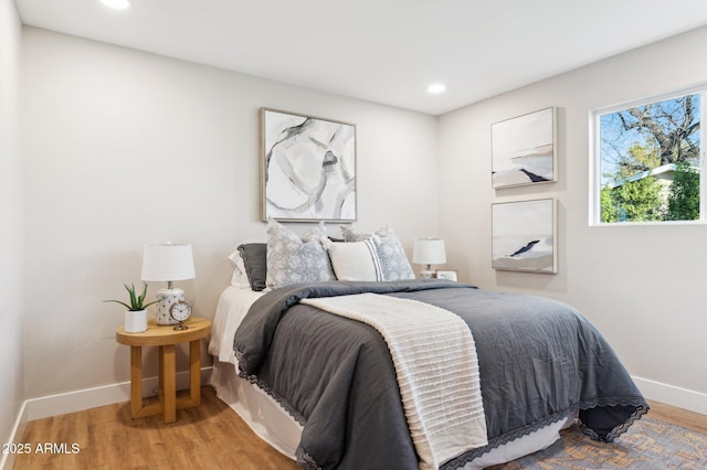 bedroom featuring wood-type flooring