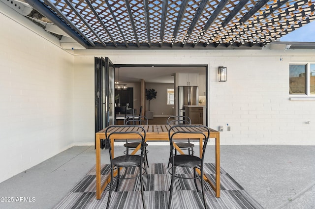 view of patio / terrace featuring a pergola