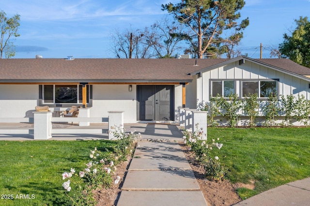 ranch-style home with a front yard