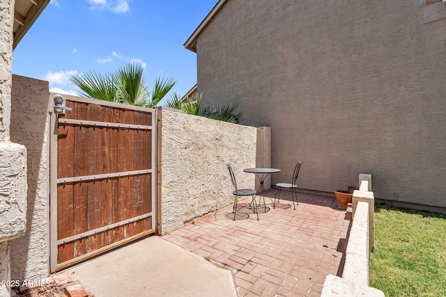 3608 W Harrison St, Chandler, AZ 85226 - view of patio / terrace with a gate and fence