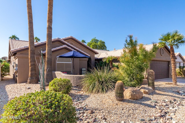 view of front of property featuring a garage