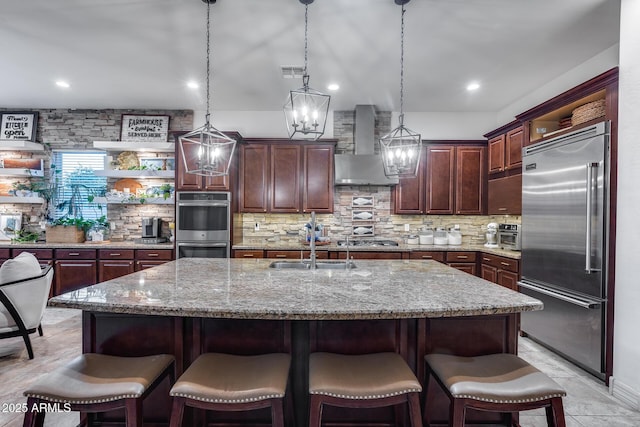 20125 E Via Del Rancho, Queen Creek, AZ 85142 - kitchen featuring visible vents, stainless steel appliances, open shelves, wall chimney range hood, and backsplash