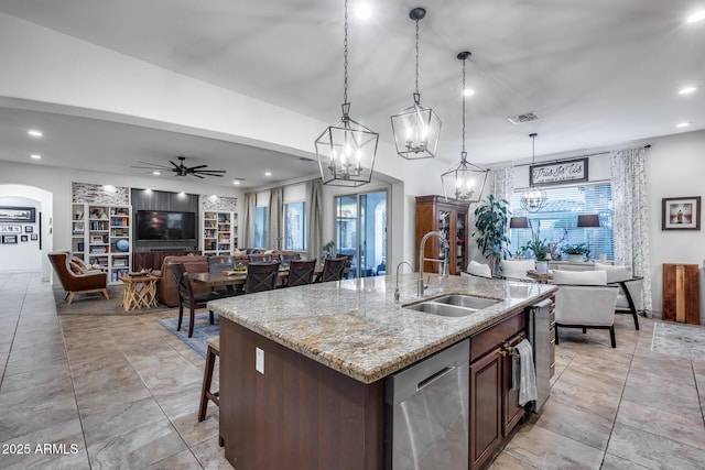 20125 E Via Del Rancho, Queen Creek, AZ 85142 - kitchen featuring stainless steel dishwasher, a center island with sink, a sink, visible vents, and built in features