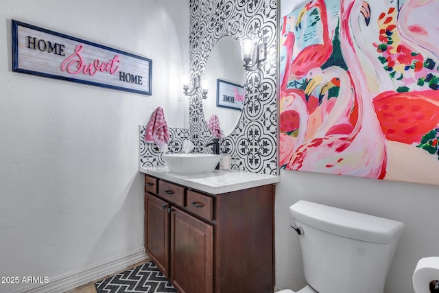 20125 E Via Del Rancho, Queen Creek, AZ 85142 - bathroom with toilet, vanity, and baseboards