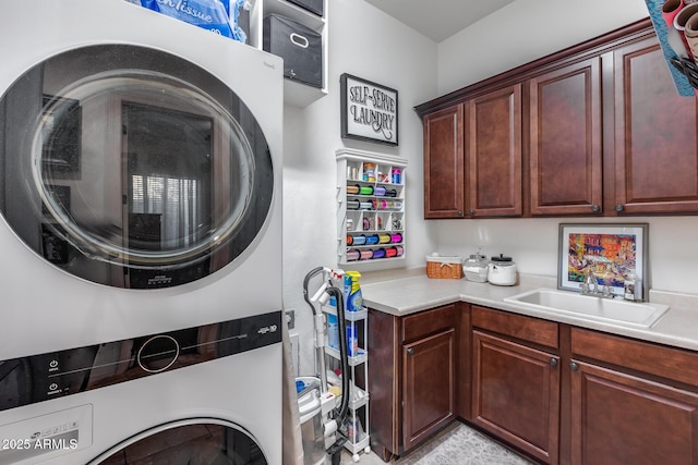20125 E Via Del Rancho, Queen Creek, AZ 85142 - washroom with cabinet space, stacked washing maching and dryer, and a sink