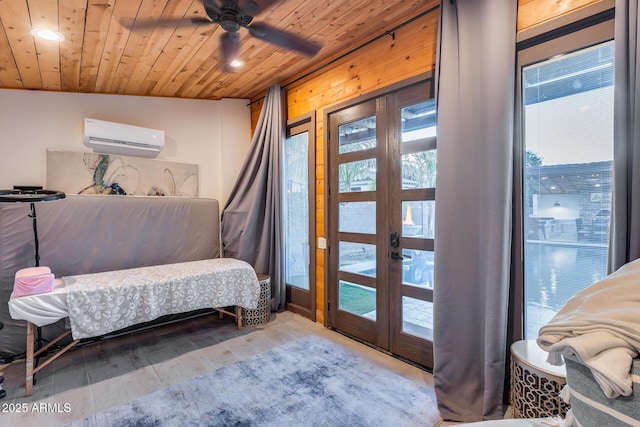 20125 E Via Del Rancho, Queen Creek, AZ 85142 - bedroom featuring wooden ceiling, french doors, wood finished floors, an AC wall unit, and recessed lighting