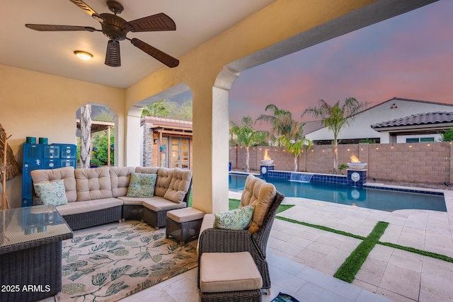 20125 E Via Del Rancho, Queen Creek, AZ 85142 - view of patio / terrace with a ceiling fan, a fenced in pool, an outdoor living space, and fence