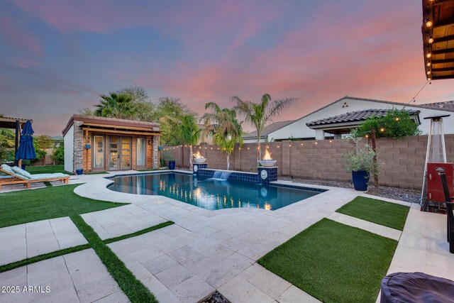 20125 E Via Del Rancho, Queen Creek, AZ 85142 - view of pool featuring an outdoor structure, a fenced backyard, a fenced in pool, an exterior structure, and a patio area