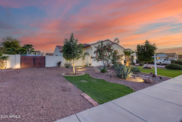 20125 E Via Del Rancho, Queen Creek, AZ 85142 - view of front of property with a gate, stucco siding, fence, an attached garage, and a yard