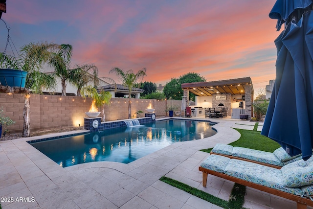 20125 E Via Del Rancho, Queen Creek, AZ 85142 - view of pool featuring a fenced in pool, exterior fireplace, a fenced backyard, a patio, and outdoor dry bar