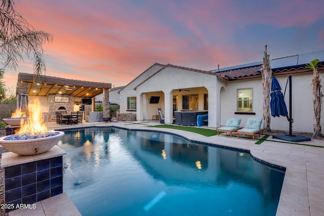 20125 E Via Del Rancho, Queen Creek, AZ 85142 - outdoor pool featuring a patio, an outdoor living space with a fireplace, and ceiling fan