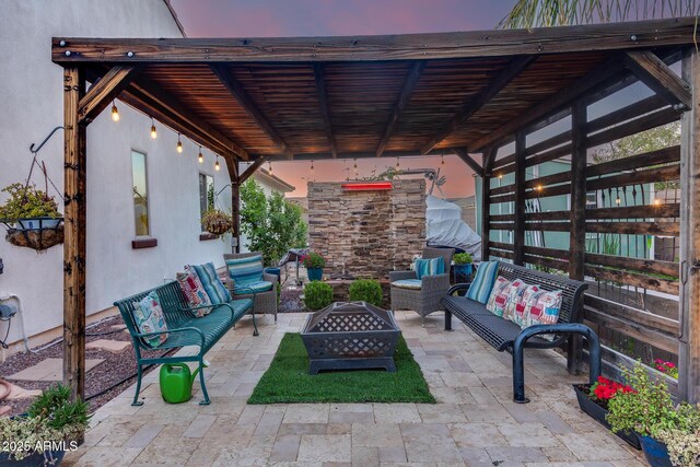 20125 E Via Del Rancho, Queen Creek, AZ 85142 - view of patio / terrace with an outdoor living space with a fire pit