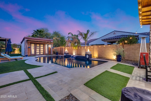 20125 E Via Del Rancho, Queen Creek, AZ 85142 - view of swimming pool with a patio area, a storage structure, a fenced backyard, and an outdoor structure