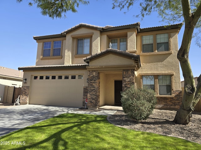 view of front of property featuring a garage, fence, and stucco siding