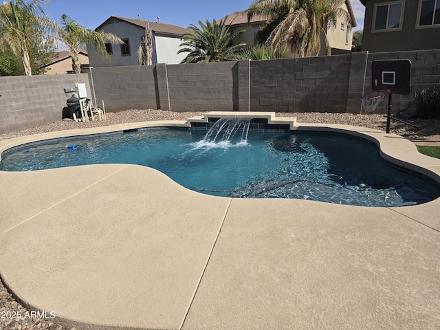 view of swimming pool with a fenced in pool, a fenced backyard, and a patio