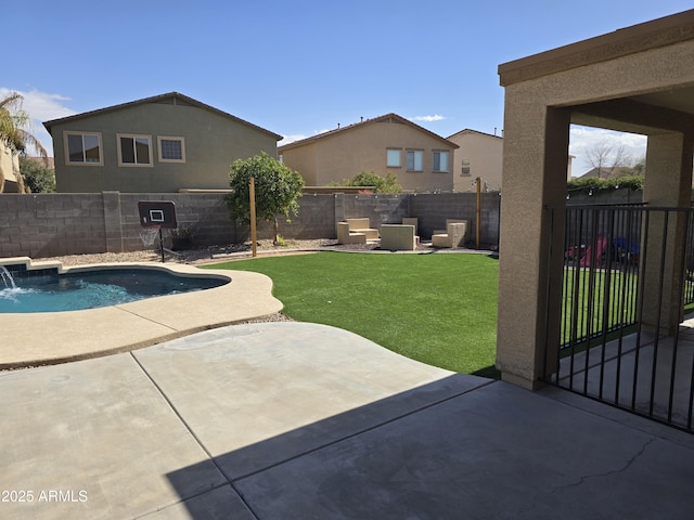 exterior space featuring a yard, a patio area, a fenced backyard, and a fenced in pool