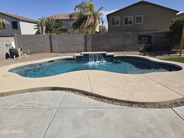 view of swimming pool featuring a patio area, a fenced backyard, and a fenced in pool