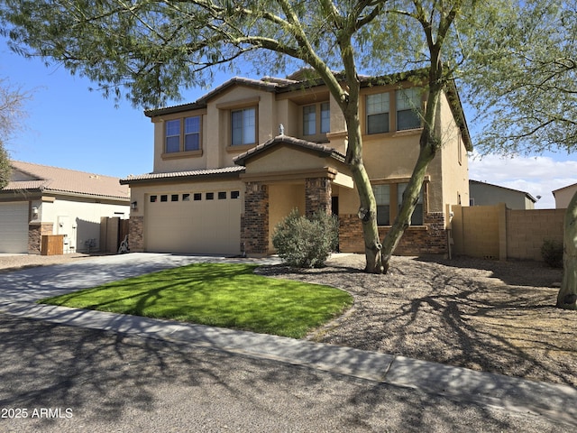 view of front facade with a tile roof, stucco siding, an attached garage, fence, and driveway