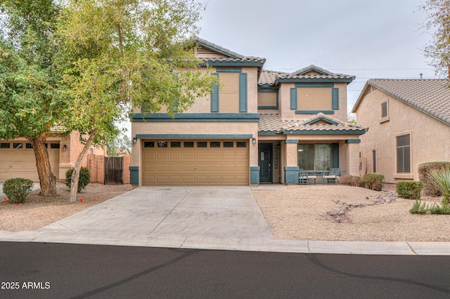 view of front of property with a garage