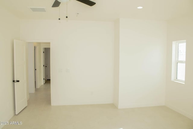 empty room featuring baseboards, a ceiling fan, visible vents, and recessed lighting