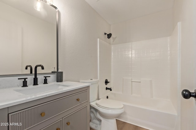 full bathroom featuring shower / bath combination, vanity, toilet, and wood-type flooring