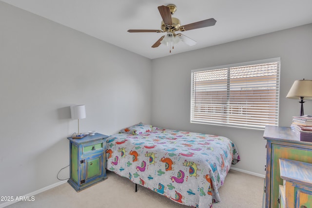 bedroom featuring baseboards, carpet floors, and ceiling fan