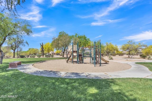 community jungle gym with a lawn