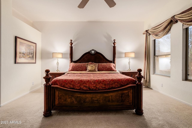 carpeted bedroom featuring ceiling fan and baseboards