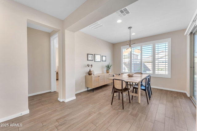 dining area featuring light hardwood / wood-style floors