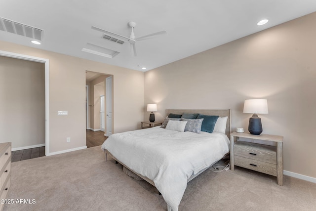 bedroom with light colored carpet and ceiling fan