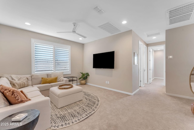 living room with light carpet and ceiling fan