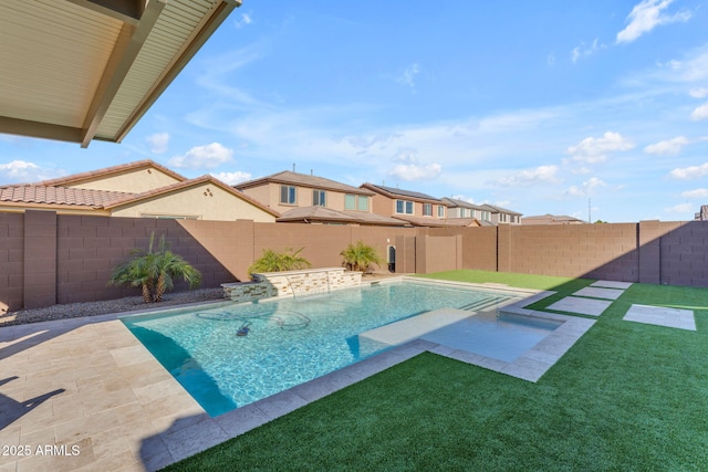 view of pool featuring a yard