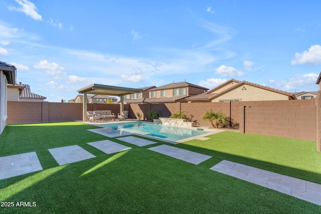 view of yard with a fenced in pool, a patio, and an outdoor hangout area