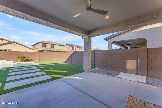 view of patio with ceiling fan