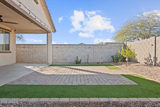 view of patio / terrace with ceiling fan