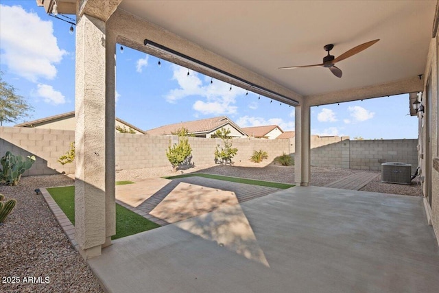 view of patio featuring central AC and ceiling fan