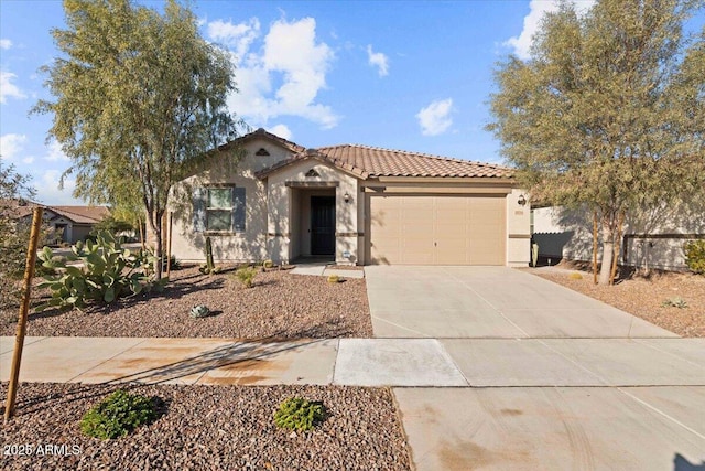 mediterranean / spanish-style house with a garage