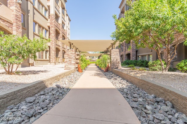 view of home's community with a pergola