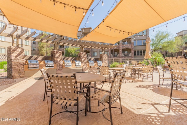 view of patio / terrace with an outdoor kitchen and area for grilling