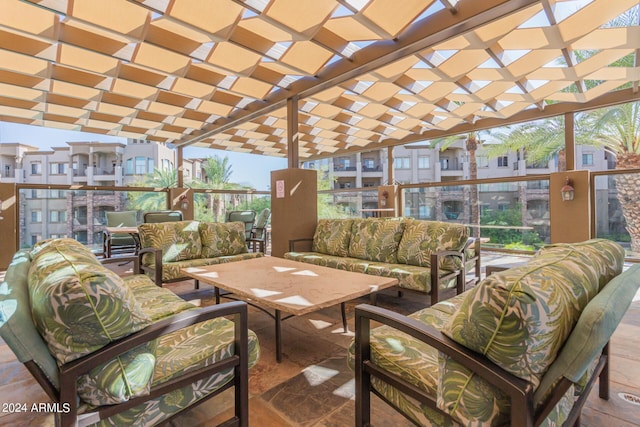 interior space featuring an outdoor hangout area and a pergola