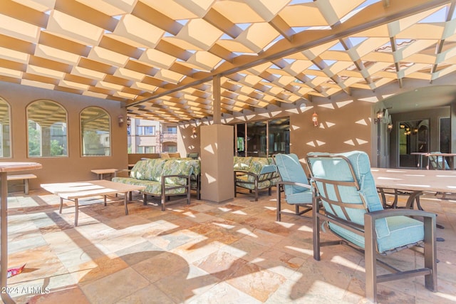 view of patio / terrace featuring a pergola and outdoor lounge area