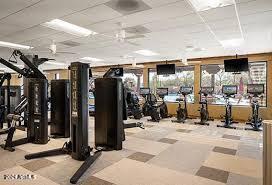 exercise room featuring a paneled ceiling