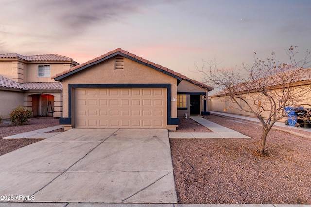 view of front of house with a garage