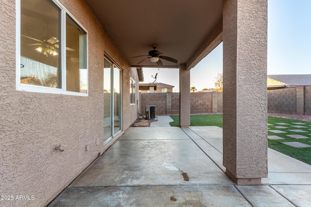 view of patio / terrace featuring ceiling fan and central air condition unit