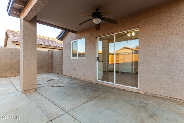 view of patio with ceiling fan