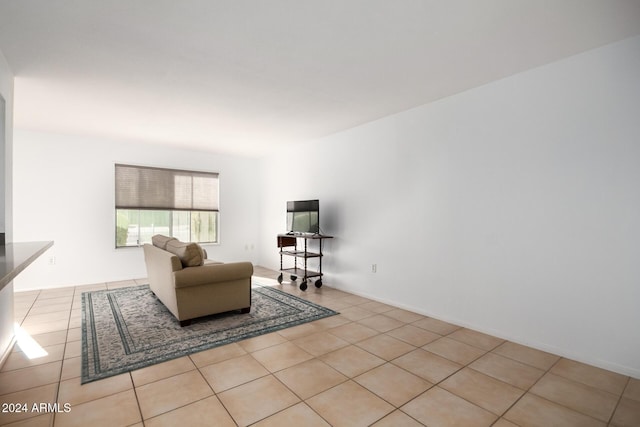 living room featuring light tile patterned floors