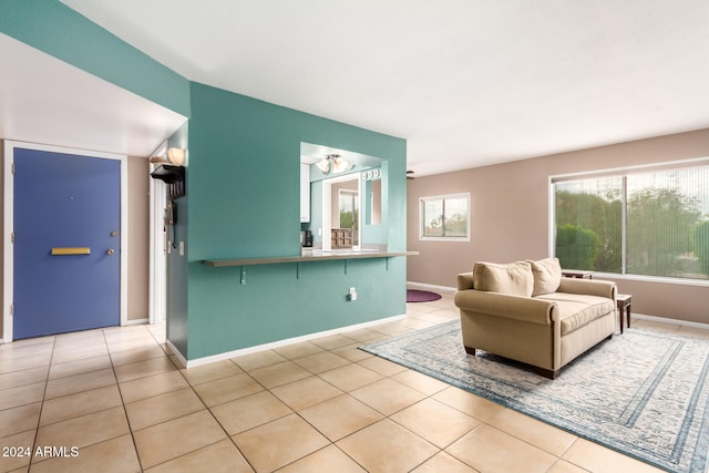 living room with light tile patterned floors