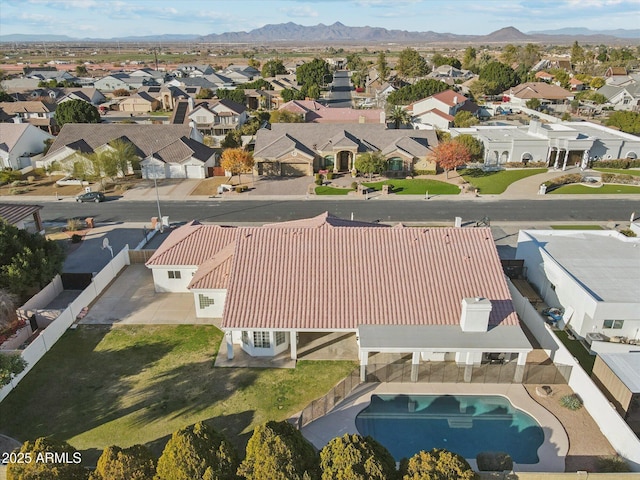 birds eye view of property featuring a mountain view