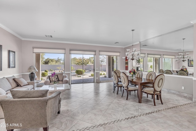 tiled dining room with a notable chandelier and ornamental molding